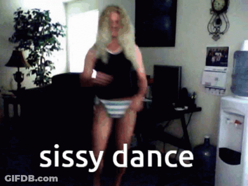 A Woman Is Dancing In A Living Room With The Words Sissy Dance Written On The Bottom GIF