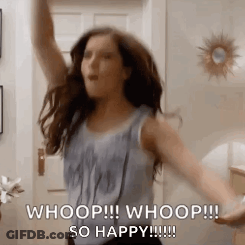 A Woman Is Dancing In A Room With Her Arms In The Air And Saying Whoop ! Whoop ! So Happy ! GIF