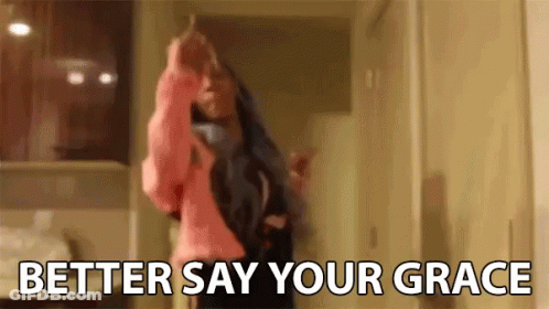 A Woman Is Dancing In A Room With The Words `` Better Say Your Grace '' Written On The Bottom . GIF