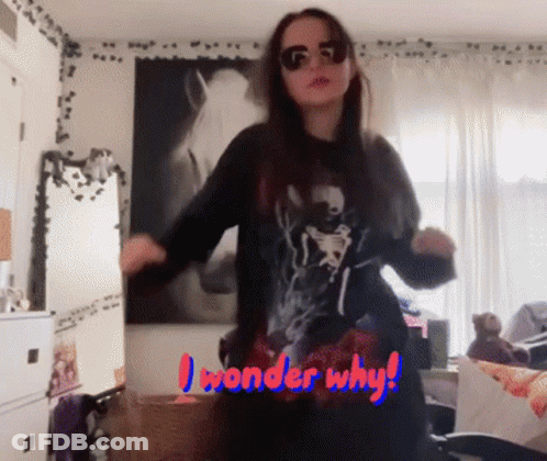 A Woman Is Dancing In A Room With The Words " I Wonder Why " Written On The Bottom GIF