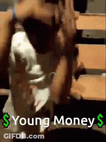A Woman Is Dancing In A Room With The Words Young Money Written On The Bottom GIF