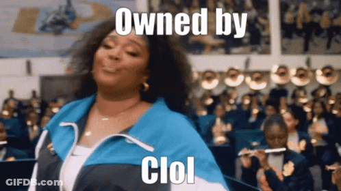 A Woman Is Dancing In Front Of A Band With The Words " Owned By Clol " Written On Her Face GIF