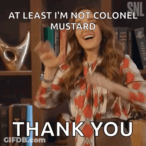 A Woman Is Dancing In Front Of A Bookshelf And Saying At Least I 'M Not Colonel Mustard . GIF