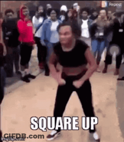 A Woman Is Dancing In Front Of A Crowd Of People With The Words `` Square Up '' Written On The Bottom . GIF