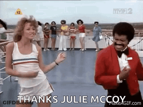 A Woman Is Dancing Next To A Man In A Tuxedo On A Boat . GIF