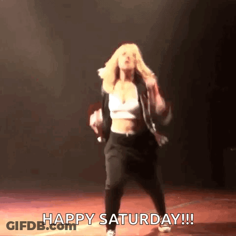 A Woman Is Dancing On A Stage And The Caption Says Happy Saturday !!! GIF