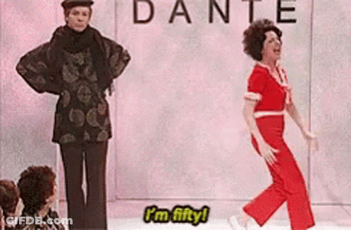 A Woman Is Dancing On A Stage In Front Of A Sign That Says Dante GIF
