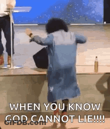 A Woman Is Dancing On A Stage With The Words `` When You Know God Cannot Lie ! '' GIF