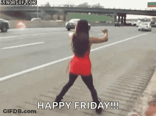 A Woman Is Dancing On The Side Of A Highway . GIF