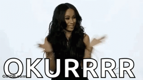 A Woman Is Dancing With Her Arms Outstretched And Sticking Her Tongue Out In Front Of A White Background . GIF