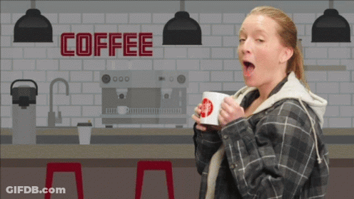 A Woman Is Drinking A Cup Of Coffee In Front Of A Sign That Says Coffee GIF