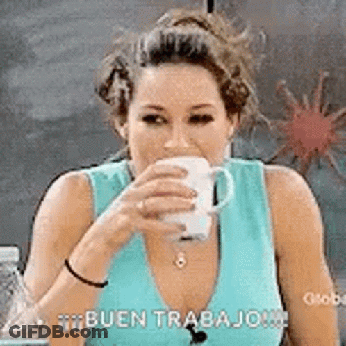 A Woman Is Drinking A Cup Of Coffee While Wearing A Blue Shirt . GIF