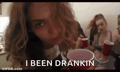 A Woman Is Drinking From A Red Cup And Saying `` I Been Drankin '' . GIF