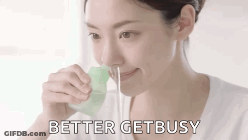 A Woman Is Drinking Water Through A Straw With The Words `` Better Get Busy '' Written Below Her . GIF