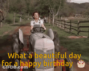 A Woman Is Driving A Tractor Down A Dirt Road With The Words " What A Beautiful Day For A Happy Birthday " GIF