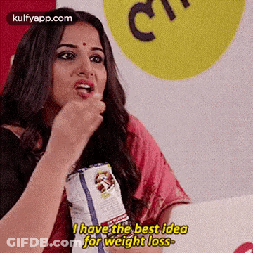 A Woman Is Eating A Bag Of Chips And Saying `` I Have The Best Idea For Weight Loss . '' GIF