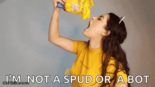 A Woman Is Eating A Bag Of Chips With The Words I 'M Not A Spud Or A Bot Below Her . GIF