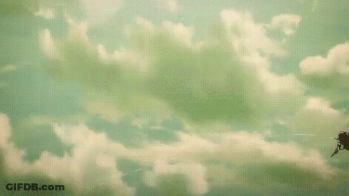 A Woman Is Flying Through The Air With A Sword And Shield . GIF