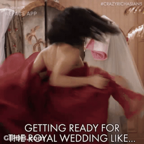 A Woman Is Getting Ready For A Royal Wedding GIF