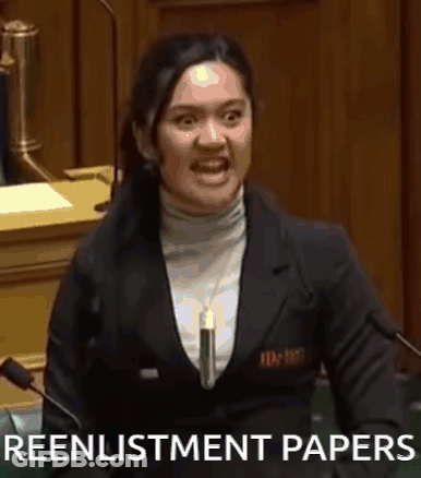 A Woman Is Giving A Speech In A Parliament And Holding A Piece Of Paper In Her Hand . GIF