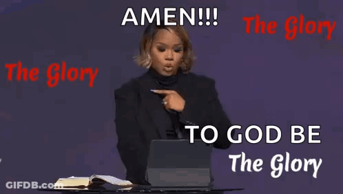 A Woman Is Giving A Speech In Front Of A Laptop Computer While Pointing At It . GIF
