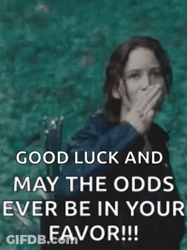 A Woman Is Giving The Middle Finger And Saying `` Good Luck And May The Odds Ever Be In Your Favor !!! '' GIF