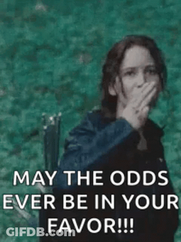 A Woman Is Giving The Middle Finger And Says `` May The Odds Ever Be In Your Favor !! '' GIF