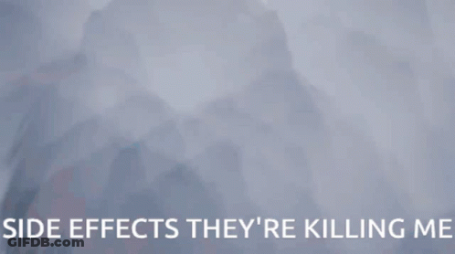 A Woman Is Hanging Upside Down With The Words Side Effects They 'Re Killing Me GIF