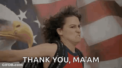 A Woman Is Holding A Bald Eagle In Front Of An American Flag And Saying `` Thank You , Ma Am '' . GIF