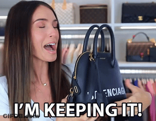 A Woman Is Holding A Black Balenciaga Purse And Says I 'M Keeping It GIF