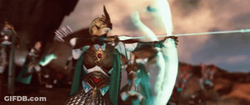 A Woman Is Holding A Bow And Arrow In Front Of A Crowd Of People . GIF