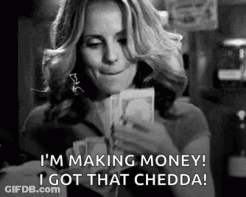 A Woman Is Holding A Bunch Of Money And Saying `` I 'M Making Money ! '' GIF