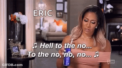 A Woman Is Holding A Can Of Soda With A Straw In Her Hand And Singing A Song . GIF
