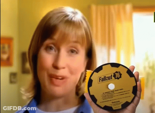 A Woman Is Holding A Cd That Says Fallout 76 GIF