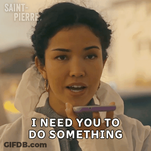 A Woman Is Holding A Cell Phone And Saying I Need You To Do Something GIF