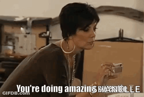 A Woman Is Holding A Cell Phone And Saying `` You 'Re Doing Amazing Chanelle '' . GIF