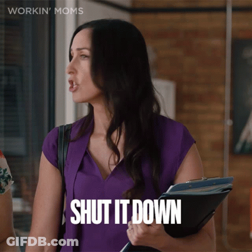 A Woman Is Holding A Clipboard And Says Shut It Down GIF