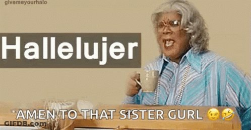 A Woman Is Holding A Cup Of Coffee And Saying Amen To That Sister Gurl GIF