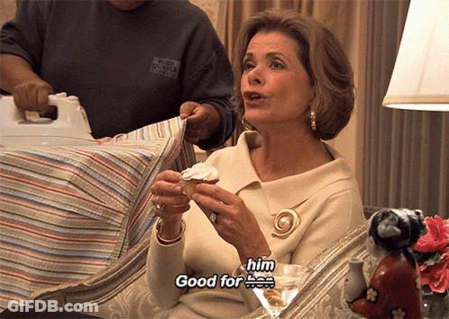 A Woman Is Holding A Cupcake And Saying " Good For Him " GIF