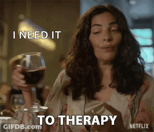 A Woman Is Holding A Glass Of Wine And Saying I Need It To Therapy GIF