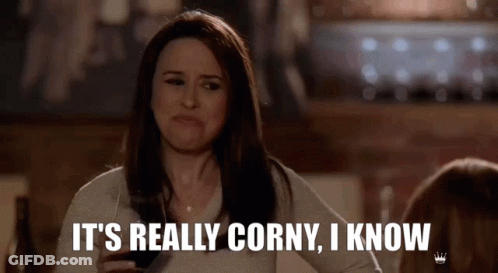 A Woman Is Holding A Glass Of Wine And Saying It 'S Really Corny I Know . GIF