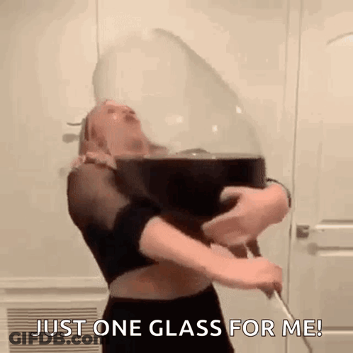 A Woman Is Holding A Glass Of Wine In Her Hands And Says `` Just One Glass For Me '' . GIF