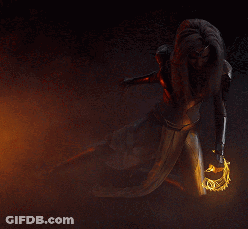 A Woman Is Holding A Glowing Sword In Her Hand GIF
