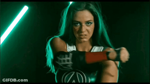 Woman Holding Green Lightsaber And Screaming GIF
