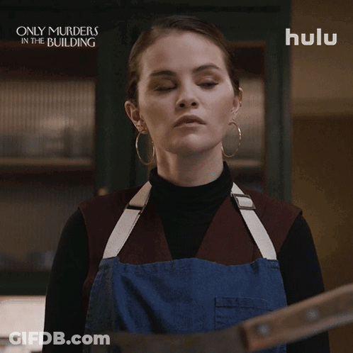 A Woman Is Holding A Large Knife And Says Fine I 'Ll Do It GIF
