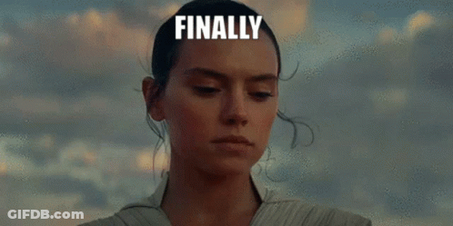 A Woman Is Holding A Lightsaber In Her Hand With The Words `` Finally Pee Lightsaber '' Written On It . GIF