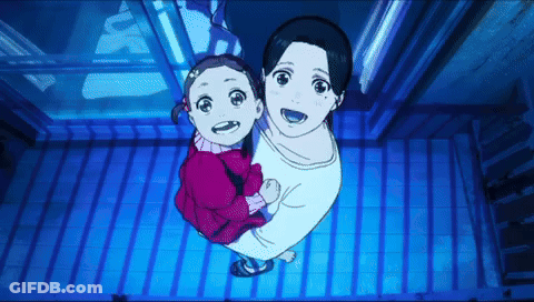 A Woman Is Holding A Little Girl In Her Arms While Looking Up GIF