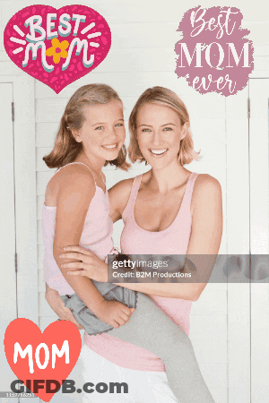 A Woman Is Holding A Little Girl In Her Arms With A Heart That Says Best Mom Ever On It GIF