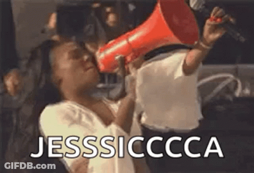 A Woman Is Holding A Megaphone In Her Hand And Shouting . GIF
