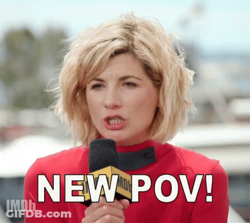 A Woman Is Holding A Microphone And Saying New Pov GIF